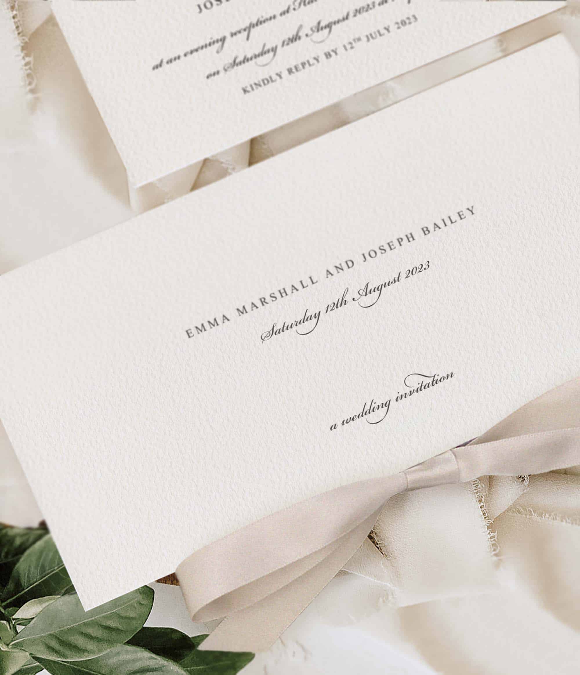sophisticated simple wedding invitation with ribbon