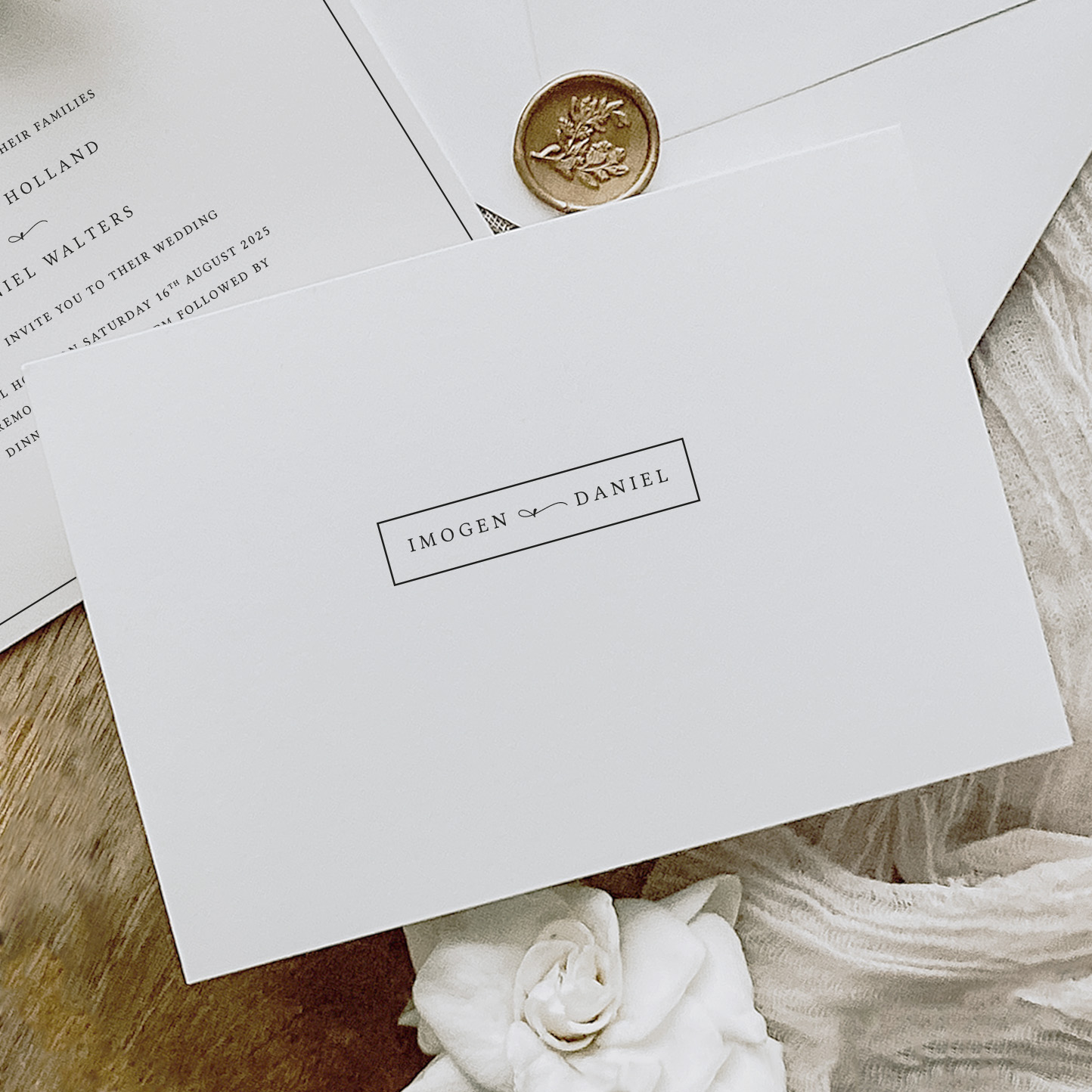 simplicity - simple modern wedding invitation shown with wax seal and envelope