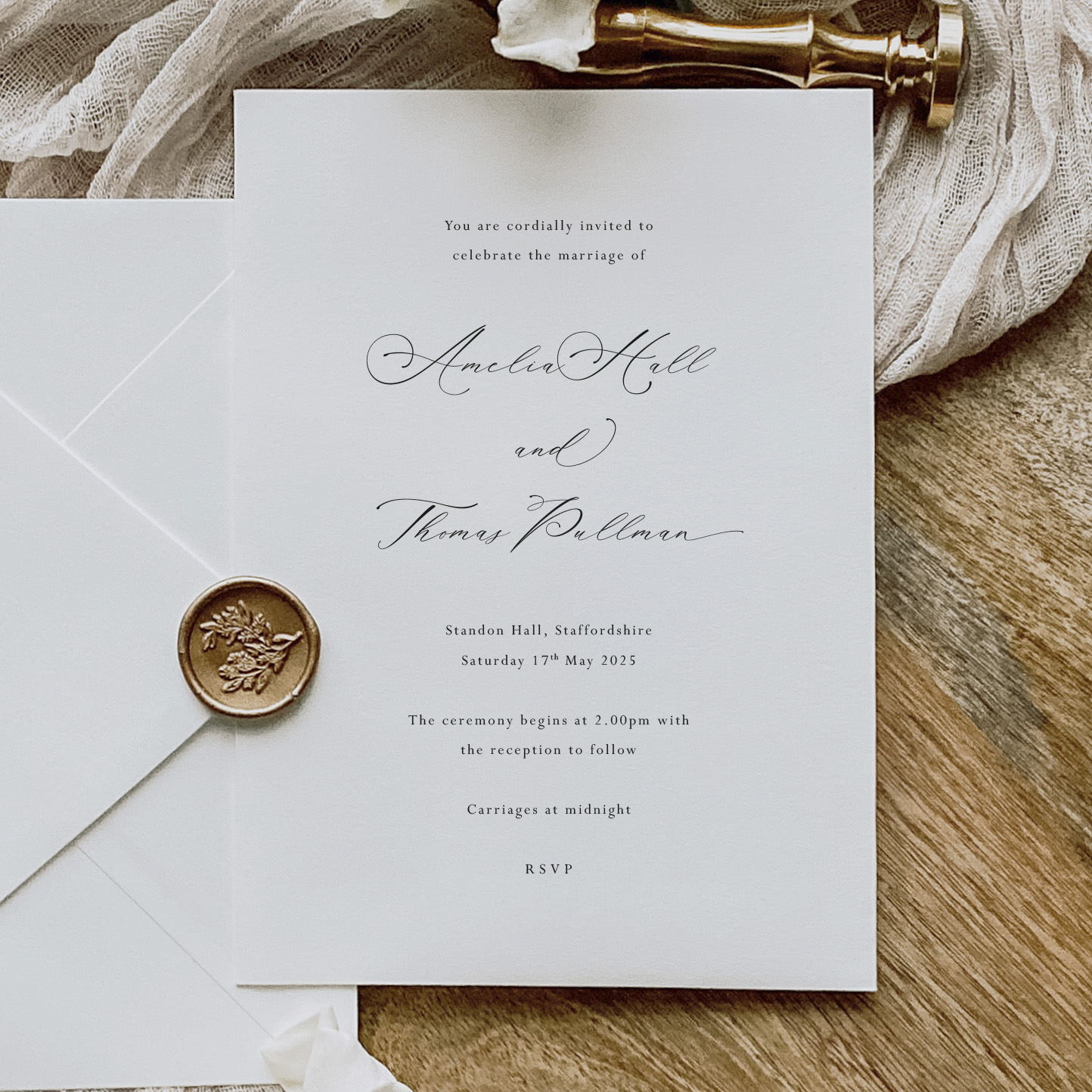 Faith - simple elegant wedding invitation and stationery set shown with wax seal and envelope on wooden background