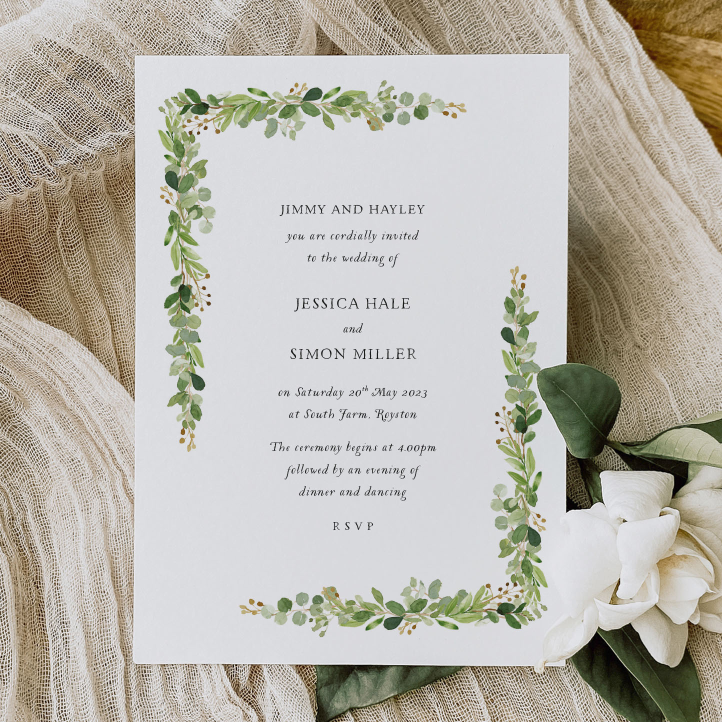 Showing Leafy Garland - Rustic wedding invitation and wedding stationery. It has a green leaf border on a white card