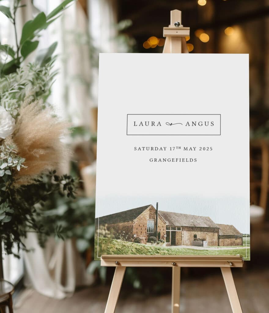 grangefields wedding venue welcome sign with illustration on easel